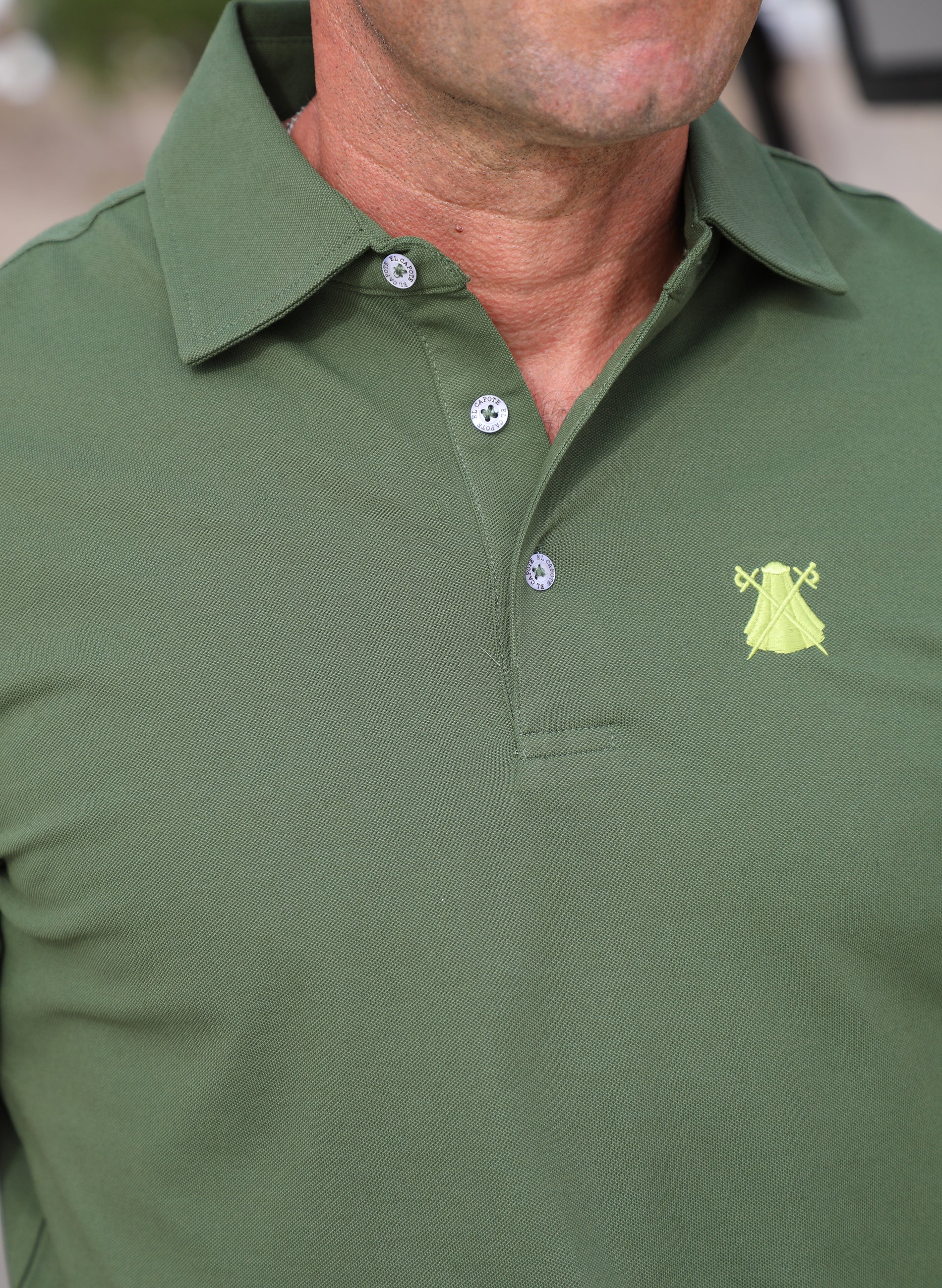 Herren-Poloshirt aus technischem Stoff in schlichtem Grün