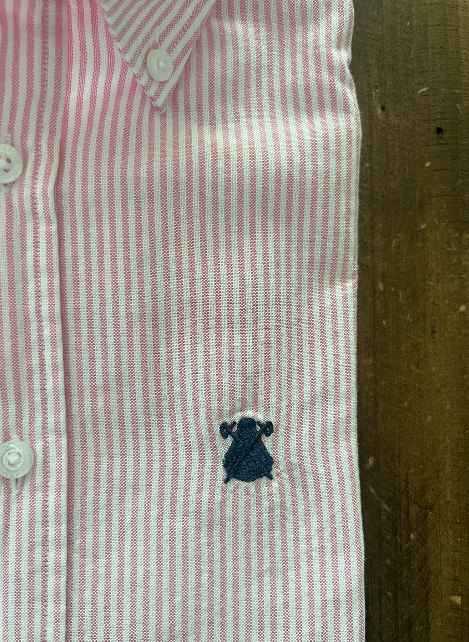 Pink striped button-down man shirt
