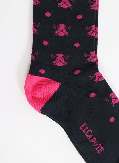 Marineblaue Socke mit Umhängen und rosa Tupfen